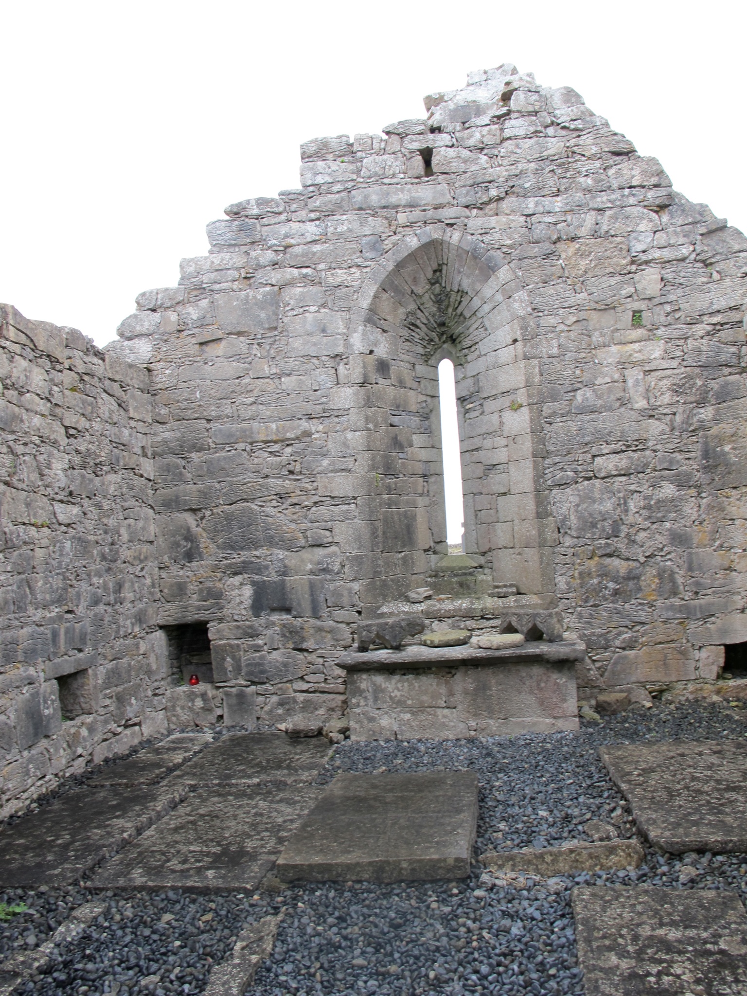 The inside of Teampull Bheanáin, you can see what is believed to be a shrine to beloved St. Patrick.